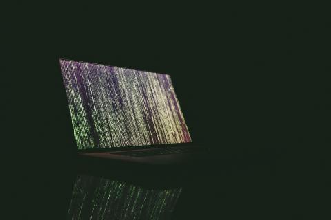 Laptop with encryted code - Markus Spiske