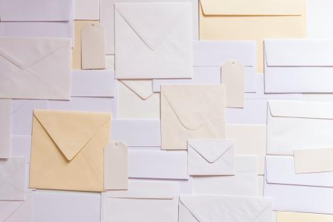 Wall of mail envelopes